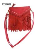 Tassel across body bag